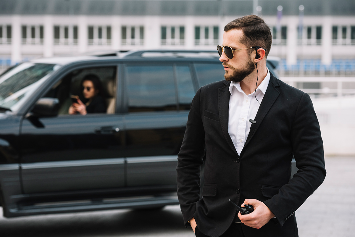 security-guard-protecting-client